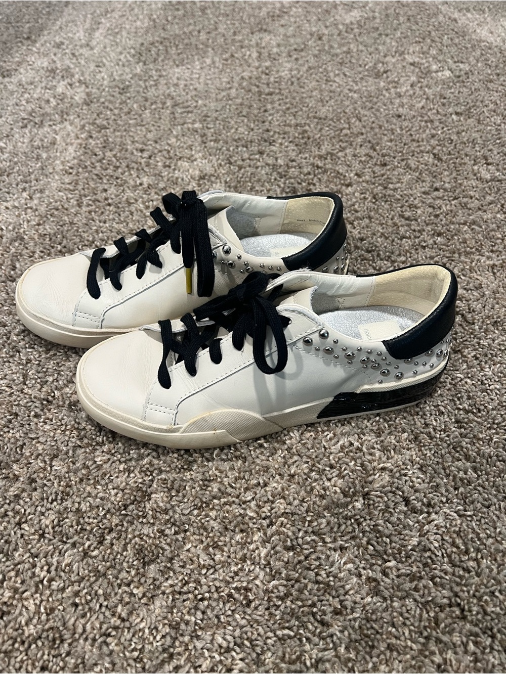 Dolce Vita Zina stud sneakers low-top silhouette silver stud along the heel 7